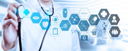 Doctor with a stethoscope in the hands and office background Medicine doctor hand working with modern computer interface as medical concept